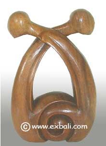 Oair of abstract wood carvings