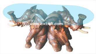 Sitting Elephants carved wooden table with glass