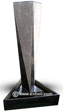 Vertical triangular water feature made from textured marble