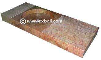 Pink marble bench top with inset basin
