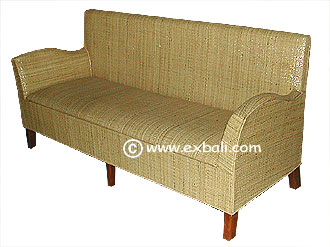 Three seater rattan sofa.
